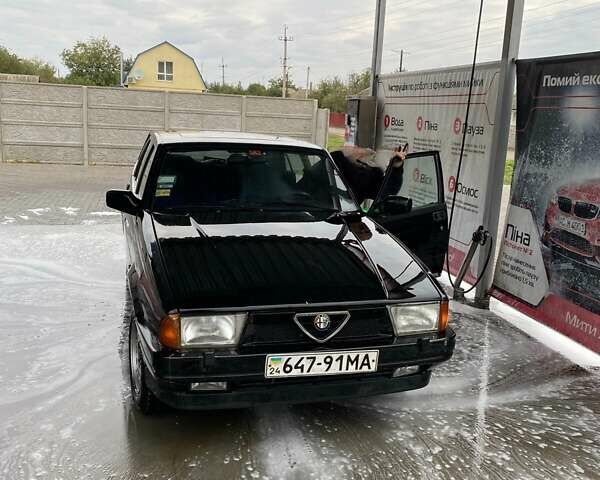 Черный Альфа Ромео 75, объемом двигателя 1.8 л и пробегом 300 тыс. км за 1100 $, фото 1 на Automoto.ua