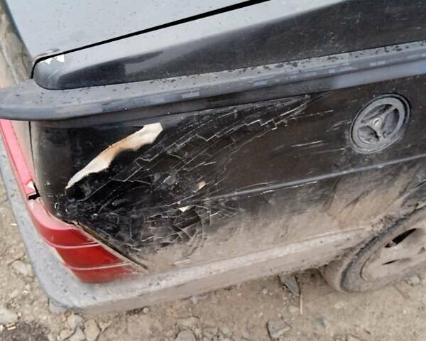 Чорний Альфа Ромео 75, об'ємом двигуна 1.8 л та пробігом 555 тис. км за 1428 $, фото 1 на Automoto.ua