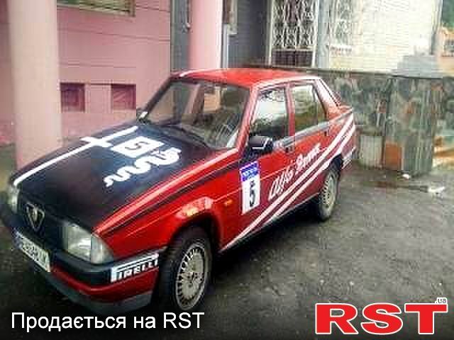 Красный Альфа Ромео 75, объемом двигателя 2 л и пробегом 300 тыс. км за 2500 $, фото 1 на Automoto.ua