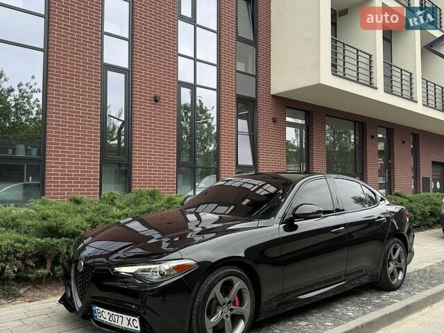 Черный Альфа Ромео Джулия, объемом двигателя 2 л и пробегом 106 тыс. км за 18700 $, фото 1 на Automoto.ua