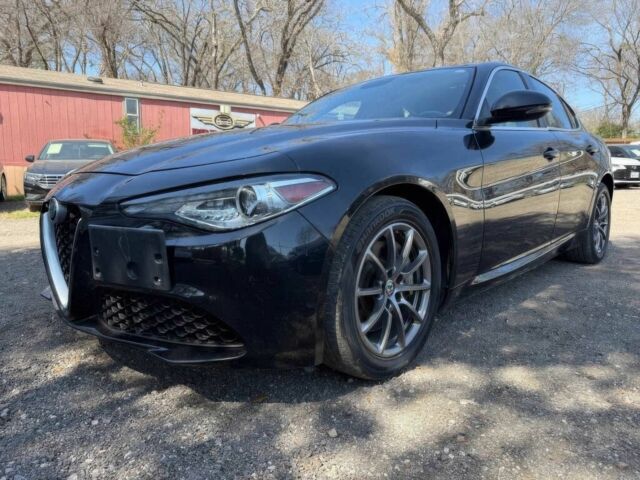 Черный Альфа Ромео Джулия, объемом двигателя 2 л и пробегом 39 тыс. км за 5000 $, фото 1 на Automoto.ua