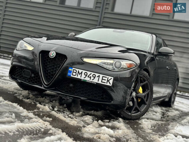Чорний Альфа Ромео Джулія, об'ємом двигуна 2 л та пробігом 65 тис. км за 21900 $, фото 1 на Automoto.ua