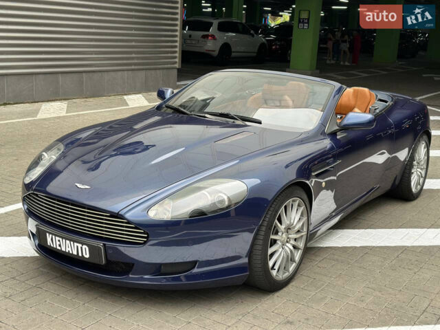 Синий Астон Мартин ДБ9, объемом двигателя 6 л и пробегом 64 тыс. км за 58000 $, фото 1 на Automoto.ua
