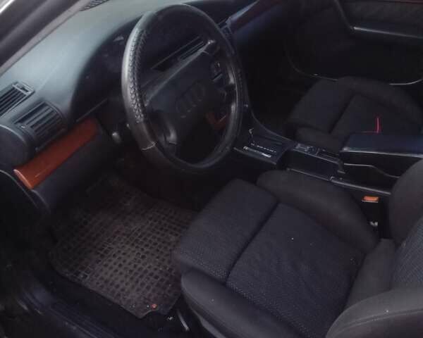 Черный Ауди 100, объемом двигателя 2.8 л и пробегом 240 тыс. км за 2500 $, фото 1 на Automoto.ua