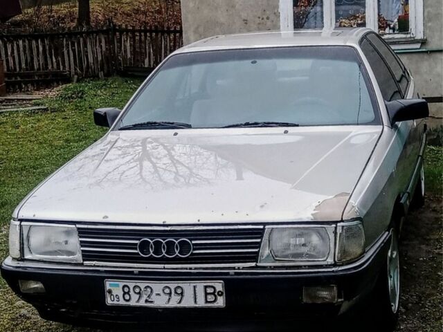 Сірий Ауді 100, об'ємом двигуна 2 л та пробігом 430 тис. км за 1300 $, фото 1 на Automoto.ua