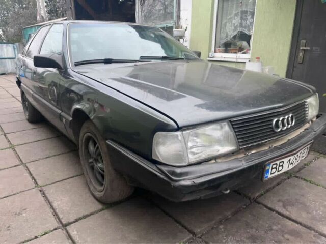 Сірий Ауді 100, об'ємом двигуна 2.3 л та пробігом 200 тис. км за 1099 $, фото 1 на Automoto.ua
