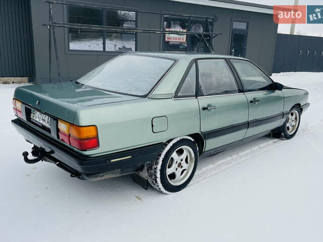 Зеленый Ауди 100, объемом двигателя 2 л и пробегом 425 тыс. км за 550 $, фото 1 на Automoto.ua
