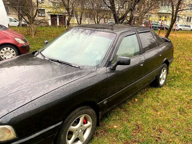 Черный Ауди 80, объемом двигателя 1.8 л и пробегом 300 тыс. км за 2300 $, фото 1 на Automoto.ua