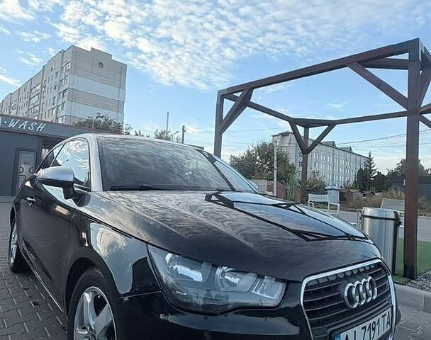 Черный Ауди А1, объемом двигателя 1.6 л и пробегом 124 тыс. км за 12200 $, фото 1 на Automoto.ua