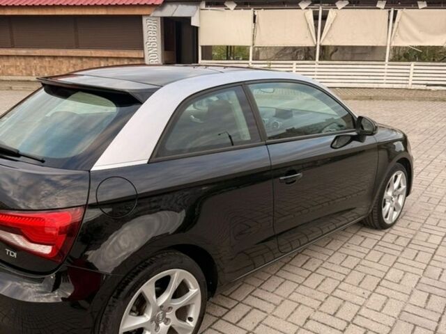 Черный Ауди А1, объемом двигателя 1.6 л и пробегом 86 тыс. км за 12500 $, фото 1 на Automoto.ua