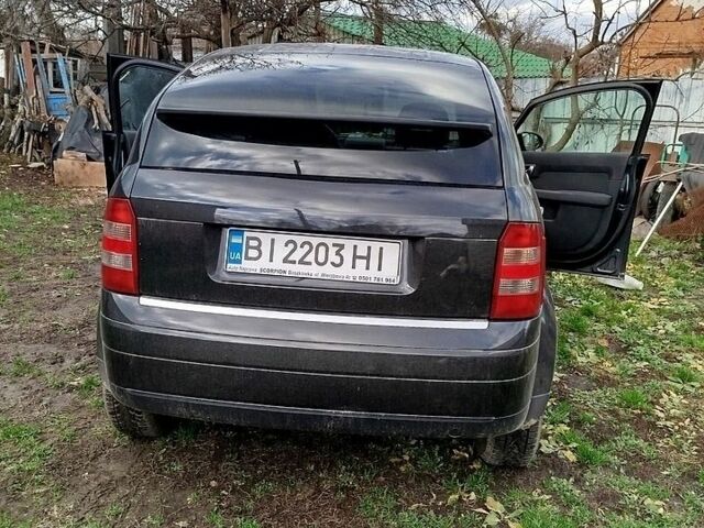 Черный Ауди А2, объемом двигателя 1.4 л и пробегом 303 тыс. км за 3500 $, фото 1 на Automoto.ua