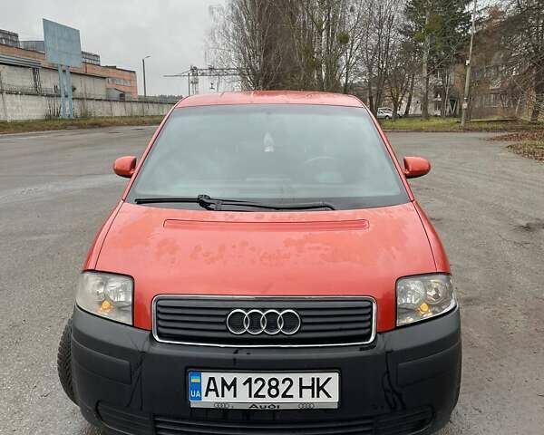 Красный Ауди А2, объемом двигателя 1.4 л и пробегом 238 тыс. км за 4000 $, фото 1 на Automoto.ua