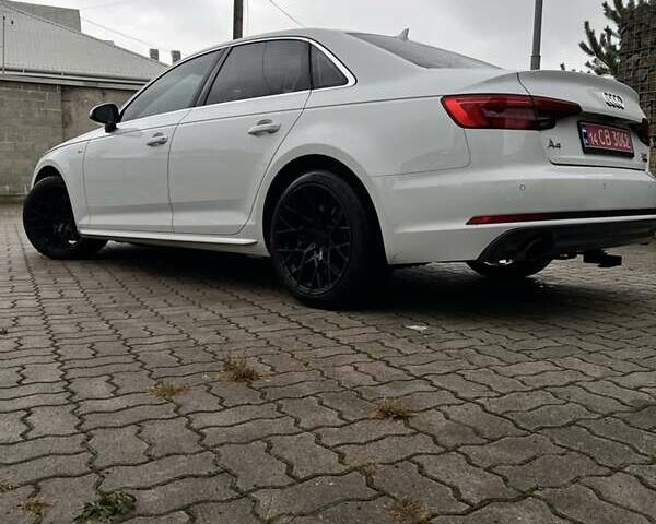 Белый Ауди А4, объемом двигателя 2 л и пробегом 130 тыс. км за 18000 $, фото 1 на Automoto.ua