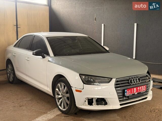 Белый Ауди А4, объемом двигателя 2 л и пробегом 210 тыс. км за 11900 $, фото 1 на Automoto.ua