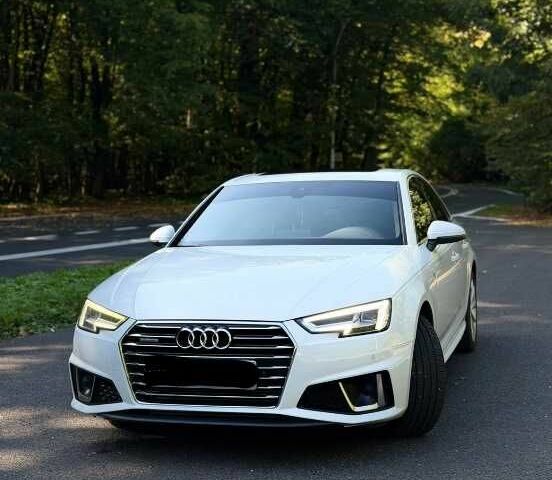 Белый Ауди А4, объемом двигателя 2 л и пробегом 69 тыс. км за 12840 $, фото 1 на Automoto.ua