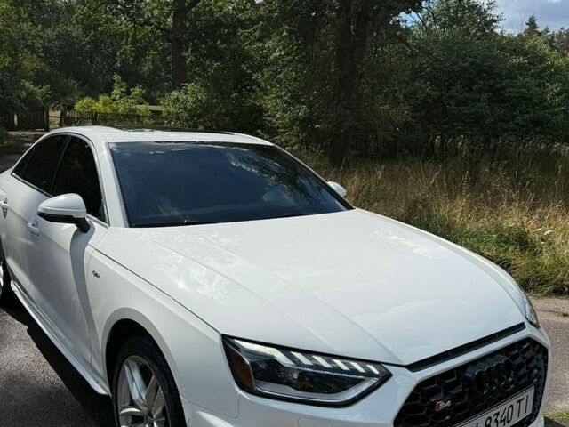 Білий Ауді А4, об'ємом двигуна 2 л та пробігом 99 тис. км за 21850 $, фото 1 на Automoto.ua