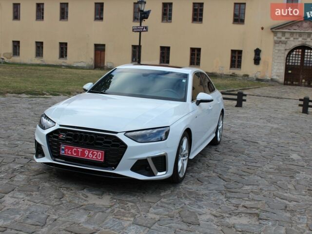 Білий Ауді А4, об'ємом двигуна 2 л та пробігом 70 тис. км за 22999 $, фото 1 на Automoto.ua