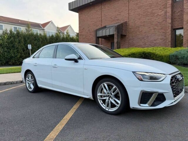 Белый Ауди А4, объемом двигателя 2 л и пробегом 33 тыс. км за 10094 $, фото 1 на Automoto.ua