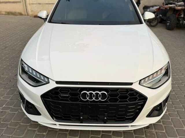 Белый Ауди А4, объемом двигателя 2 л и пробегом 74 тыс. км за 22500 $, фото 1 на Automoto.ua
