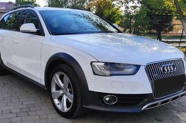 Білий Ауді А4, об'ємом двигуна 2 л та пробігом 123 тис. км за 8950 $, фото 1 на Automoto.ua