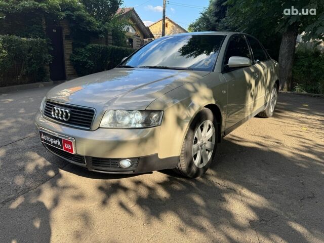 Бежевый Ауди А4, объемом двигателя 2 л и пробегом 300 тыс. км за 5990 $, фото 1 на Automoto.ua