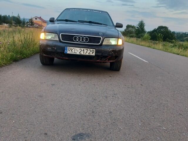 Чорний Ауді А4, об'ємом двигуна 1 л та пробігом 377 тис. км за 886 $, фото 1 на Automoto.ua