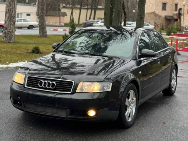 Чорний Ауді А4, об'ємом двигуна 2 л та пробігом 336 тис. км за 2800 $, фото 1 на Automoto.ua