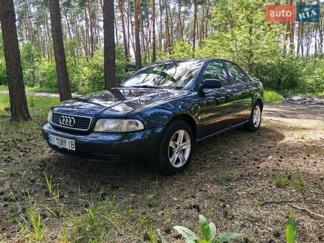 Черный Ауди А4, объемом двигателя 1.6 л и пробегом 322 тыс. км за 3550 $, фото 1 на Automoto.ua