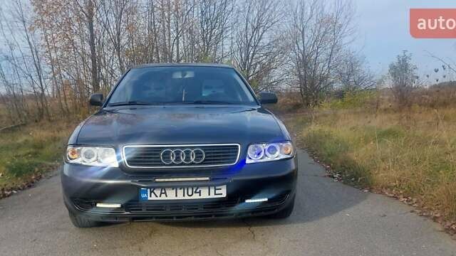 Черный Ауди А4, объемом двигателя 1.6 л и пробегом 276 тыс. км за 3500 $, фото 1 на Automoto.ua