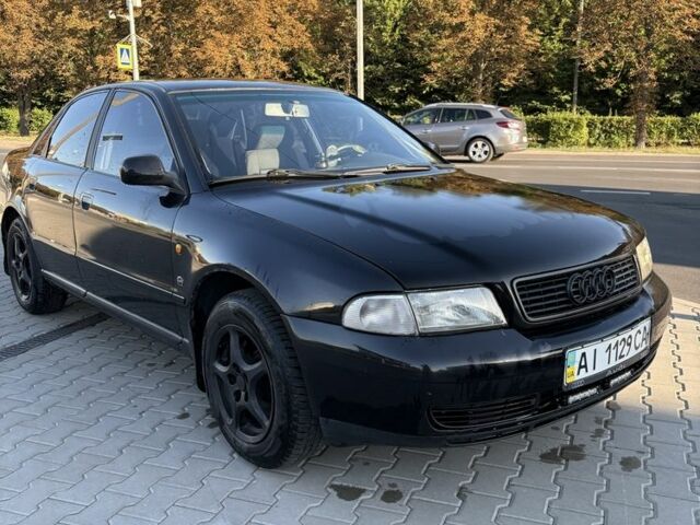 Черный Ауди А4, объемом двигателя 1.6 л и пробегом 420 тыс. км за 2602 $, фото 1 на Automoto.ua
