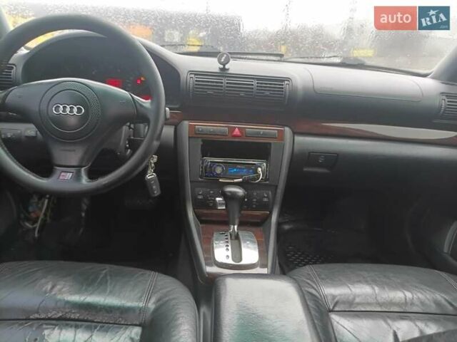 Черный Ауди А4, объемом двигателя 1.8 л и пробегом 100 тыс. км за 3500 $, фото 1 на Automoto.ua