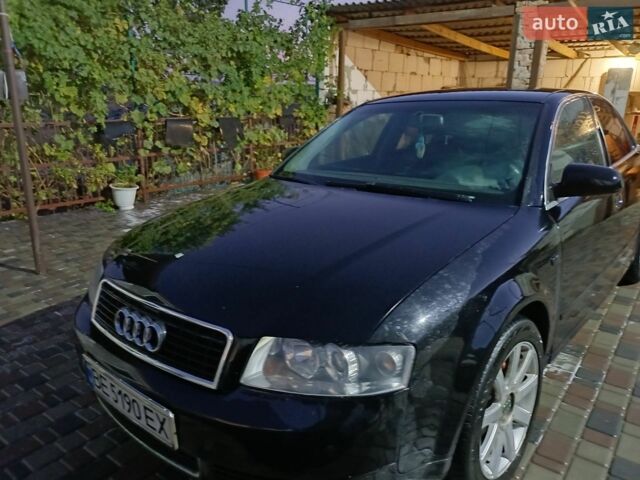 Чорний Ауді А4, об'ємом двигуна 2 л та пробігом 395 тис. км за 3900 $, фото 1 на Automoto.ua