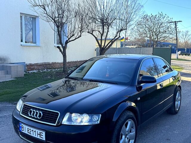 Черный Ауди А4, объемом двигателя 1.6 л и пробегом 350 тыс. км за 4200 $, фото 1 на Automoto.ua