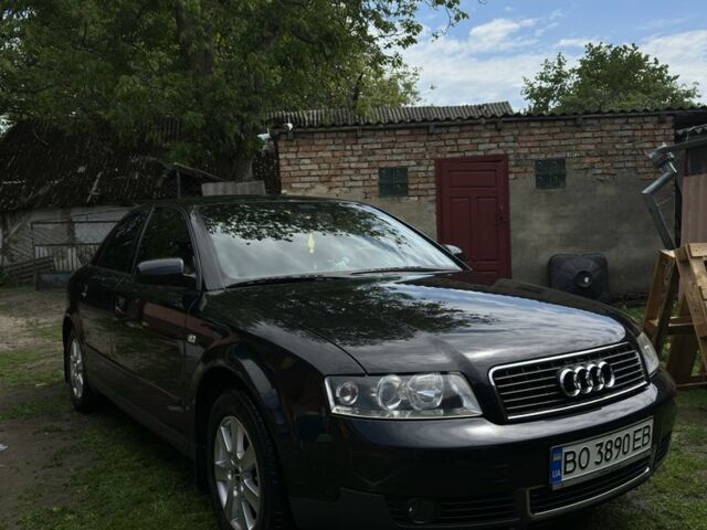 Черный Ауди А4, объемом двигателя 2 л и пробегом 215 тыс. км за 5400 $, фото 1 на Automoto.ua