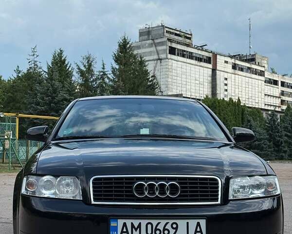 Чорний Ауді А4, об'ємом двигуна 1.6 л та пробігом 243 тис. км за 5100 $, фото 1 на Automoto.ua