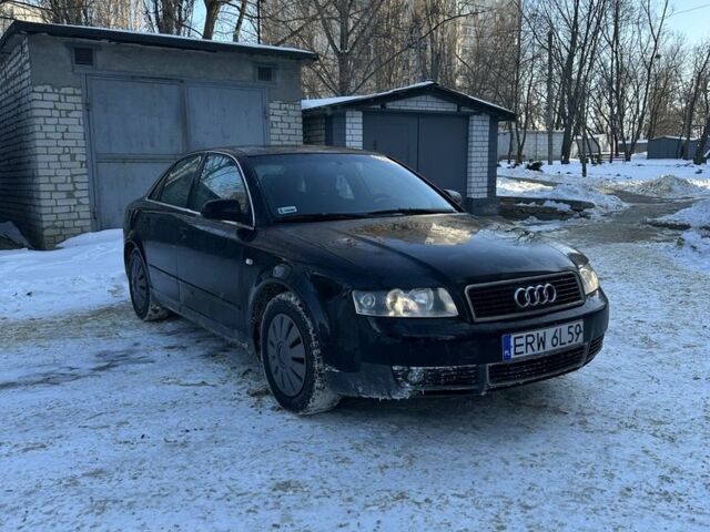 Чорний Ауді А4, об'ємом двигуна 1.8 л та пробігом 340 тис. км за 1999 $, фото 1 на Automoto.ua