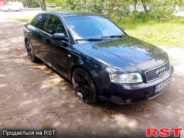 Черный Ауди А4, объемом двигателя 2.5 л и пробегом 311 тыс. км за 4000 $, фото 1 на Automoto.ua