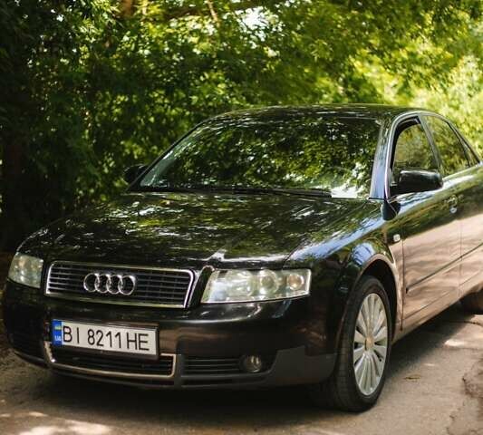 Черный Ауди А4, объемом двигателя 1.6 л и пробегом 340 тыс. км за 5500 $, фото 1 на Automoto.ua