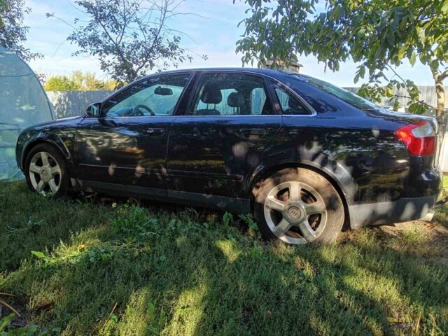 Чорний Ауді А4, об'ємом двигуна 2 л та пробігом 250 тис. км за 3601 $, фото 1 на Automoto.ua