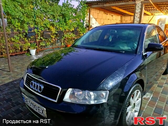 Черный Ауди А4, объемом двигателя 2 л и пробегом 390 тыс. км за 4300 $, фото 1 на Automoto.ua