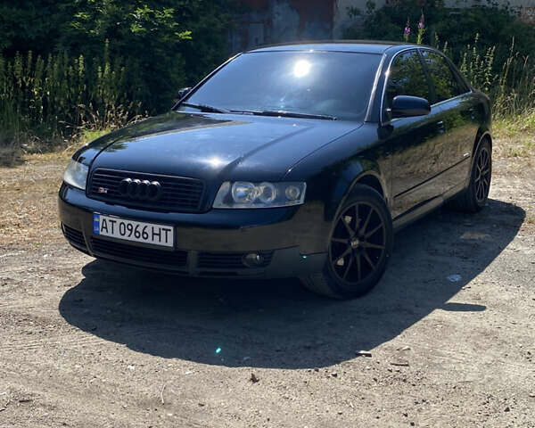 Черный Ауди А4, объемом двигателя 2 л и пробегом 315 тыс. км за 4999 $, фото 1 на Automoto.ua