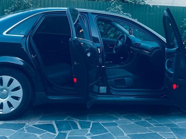 Чорний Ауді А4, об'ємом двигуна 2 л та пробігом 250 тис. км за 5500 $, фото 1 на Automoto.ua