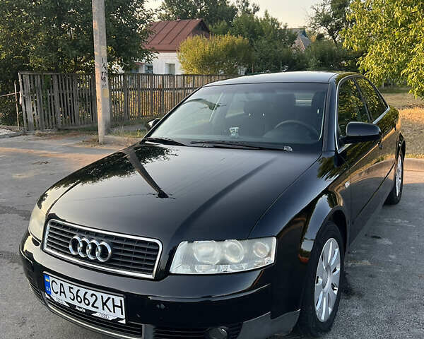 Черный Ауди А4, объемом двигателя 1.6 л и пробегом 215 тыс. км за 5600 $, фото 1 на Automoto.ua