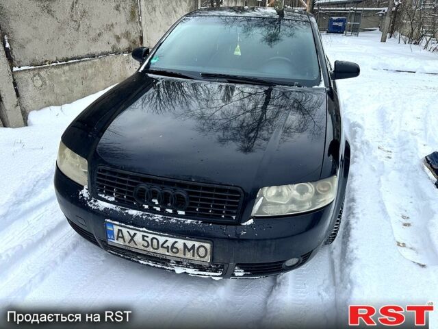 Черный Ауди А4, объемом двигателя 2 л и пробегом 250 тыс. км за 4500 $, фото 1 на Automoto.ua
