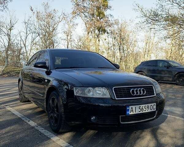 Черный Ауди А4, объемом двигателя 2 л и пробегом 240 тыс. км за 4650 $, фото 1 на Automoto.ua