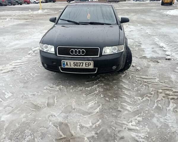 Черный Ауди А4, объемом двигателя 2.5 л и пробегом 317 тыс. км за 5200 $, фото 1 на Automoto.ua