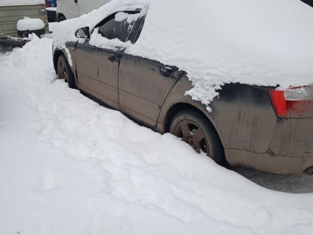 Черный Ауди А4, объемом двигателя 2 л и пробегом 320 тыс. км за 3400 $, фото 1 на Automoto.ua