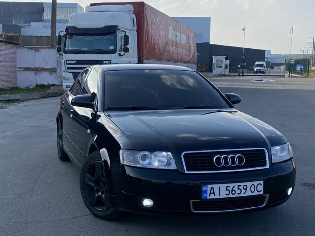 Черный Ауди А4, объемом двигателя 2 л и пробегом 251 тыс. км за 5018 $, фото 1 на Automoto.ua