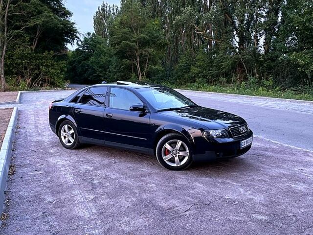 Чорний Ауді А4, об'ємом двигуна 2 л та пробігом 211 тис. км за 5300 $, фото 1 на Automoto.ua