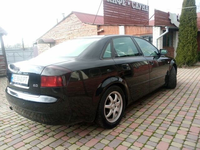 Чорний Ауді А4, об'ємом двигуна 2 л та пробігом 260 тис. км за 4999 $, фото 1 на Automoto.ua